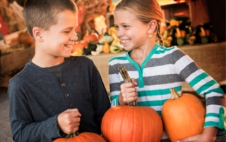 Kids with pumpkins